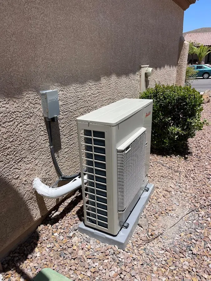 Residential air conditioning condenser unit in Harvest